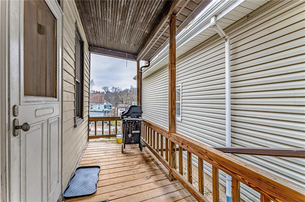16 Spring Street Etna, PA 15223 - Photo 17 of 21 a view of a balcony with wooden floor