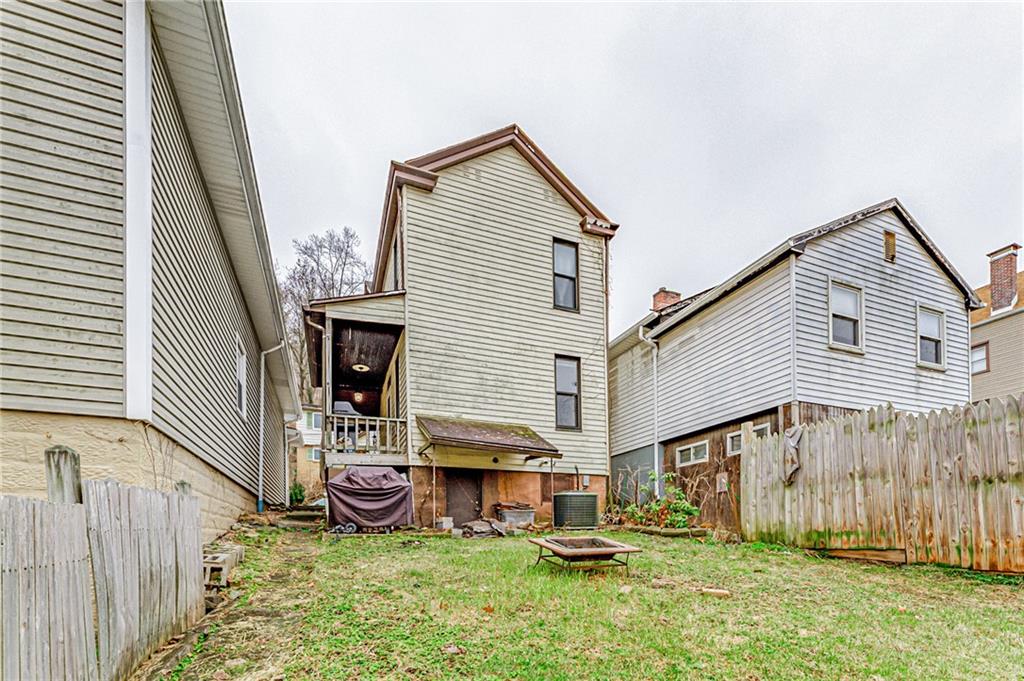 16 Spring Street Etna, PA 15223 - Photo 19 of 21 a view of a house with a yard and sitting area