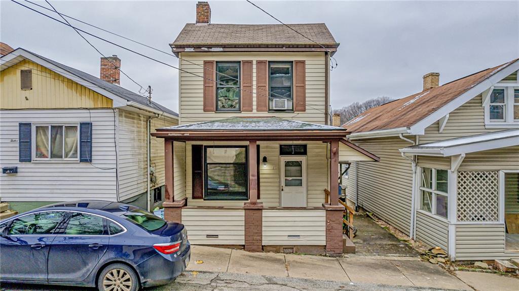 16 Spring Street Etna, PA 15223 - Photo 20 of 21 a front view of a house with plants