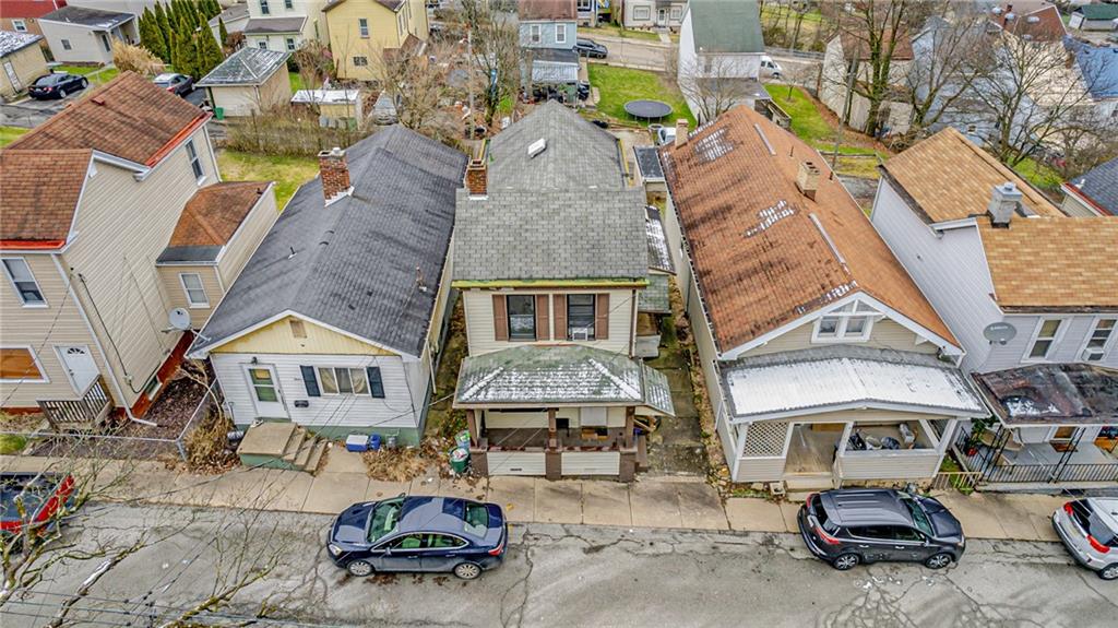 16 Spring Street Etna, PA 15223 - Photo 2 of 21 a car parked in front of a brick house