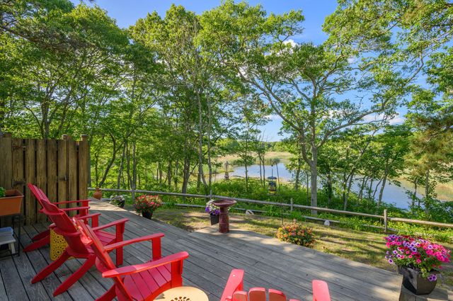 a garden view with a seating space