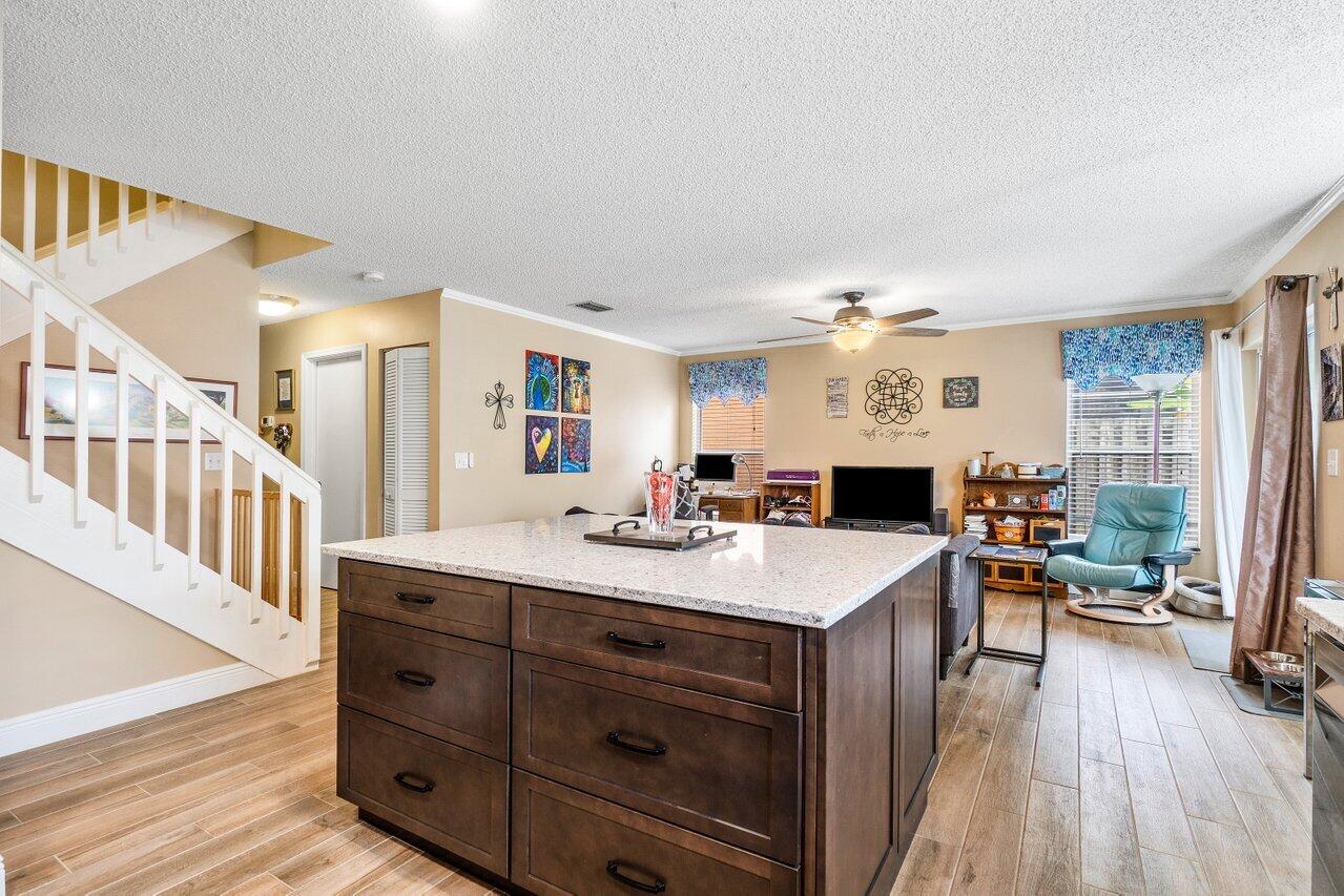 7250 Davit Circle Lake Worth, FL 33467 - Photo 11 of 35 a view of a living room kitchen and a sink