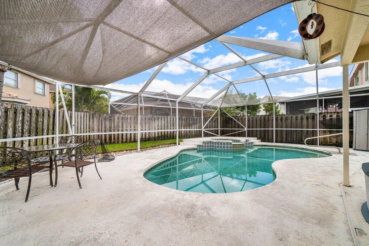 7250 Davit Circle Lake Worth, FL 33467 - Photo 26 of 35 a view of a swimming pool with a patio