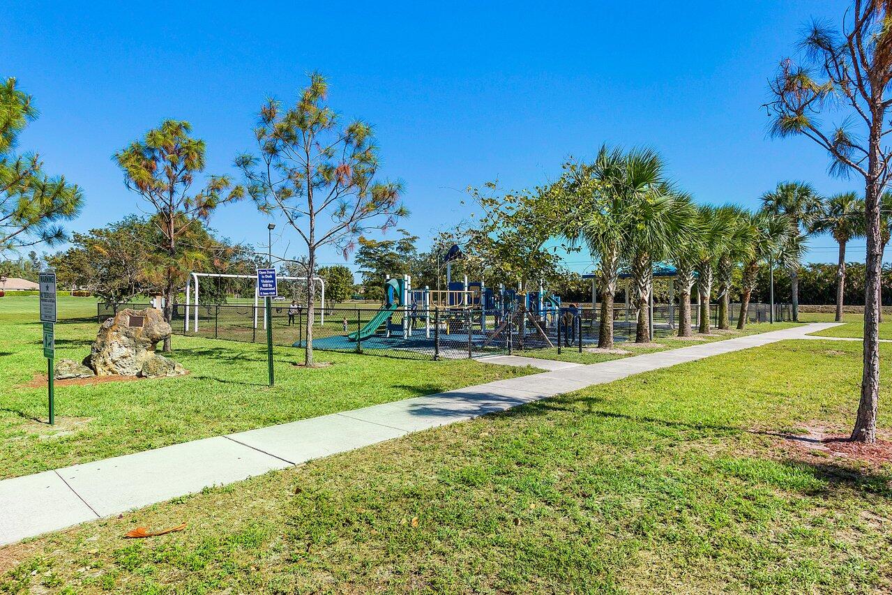 7250 Davit Circle Lake Worth, FL 33467 - Photo 34 of 35 a view of a park with plants and palm trees