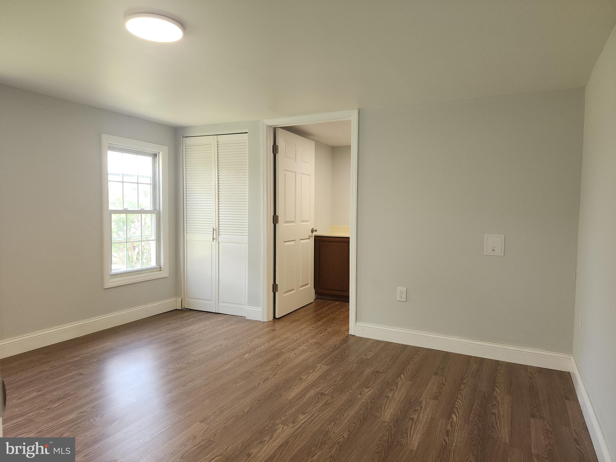 41 Mountain View Terrace Newville, PA 17241 - Photo 29 of 34 an empty room with wooden floor and windows
