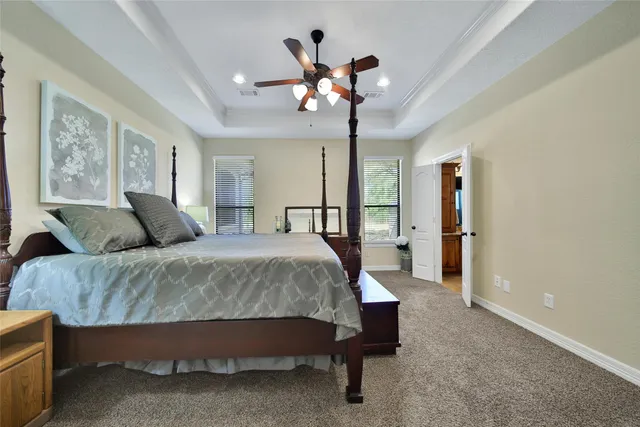 a bathroom with a tub and a sink