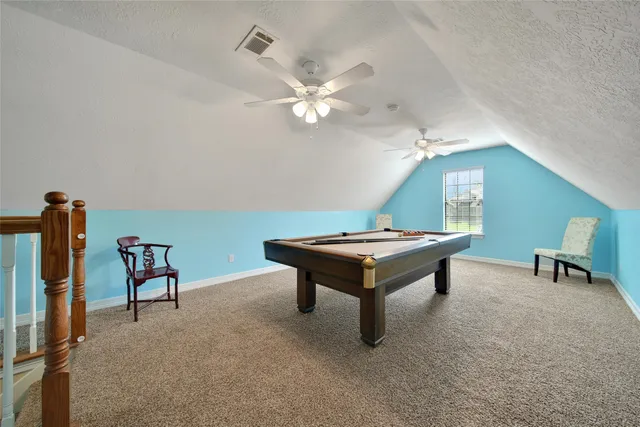 a view of green field with trees