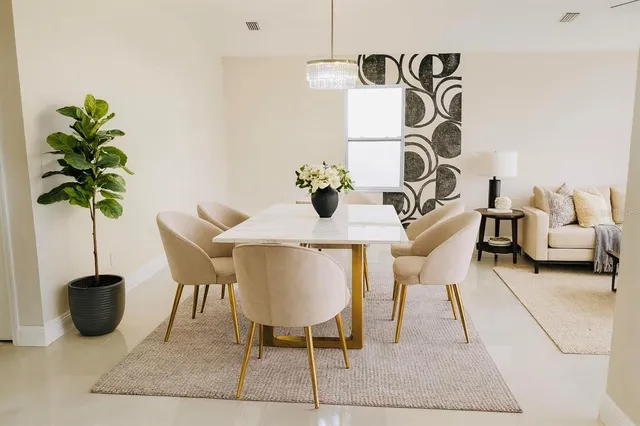 a view of a dining room with furniture