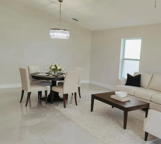 a view of a dining room with furniture