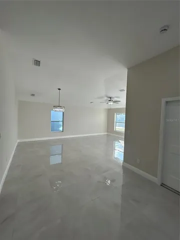 a view of a refrigerator in a kitchen