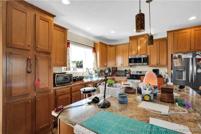 a outdoor space with furniture a window and appliances