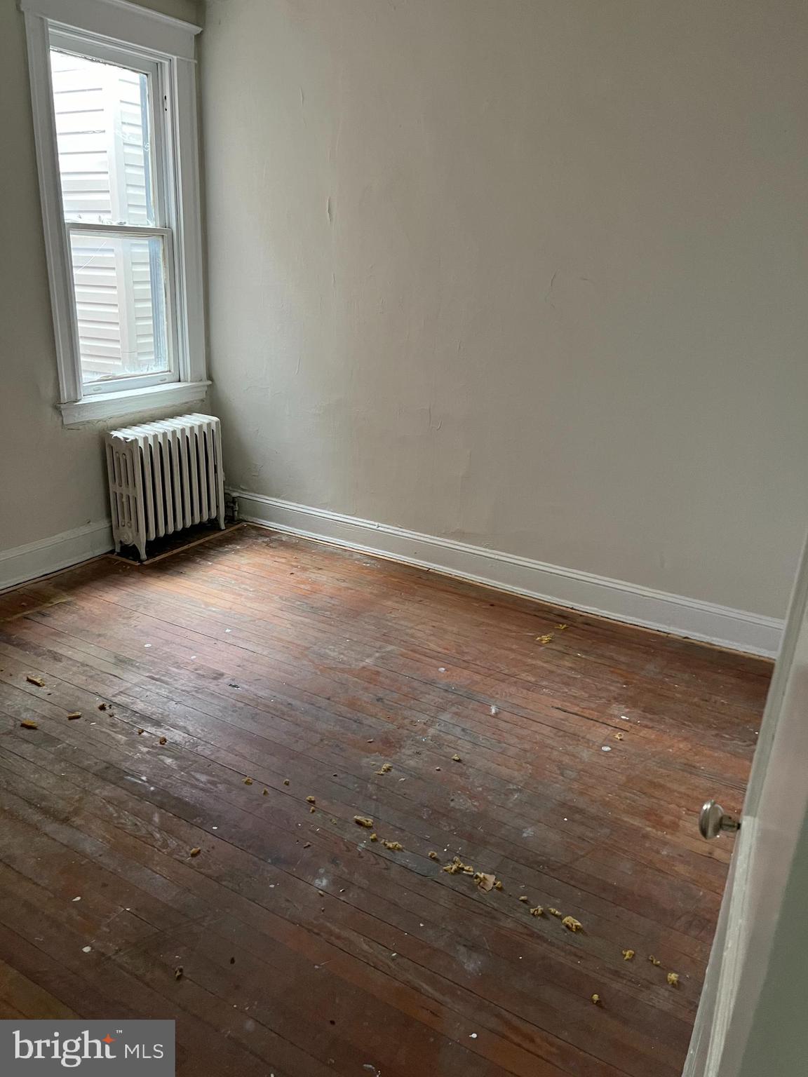 1209 Oakhurst Place Baltimore, MD 21216 - Photo 13 of 14 a view of an empty room and window