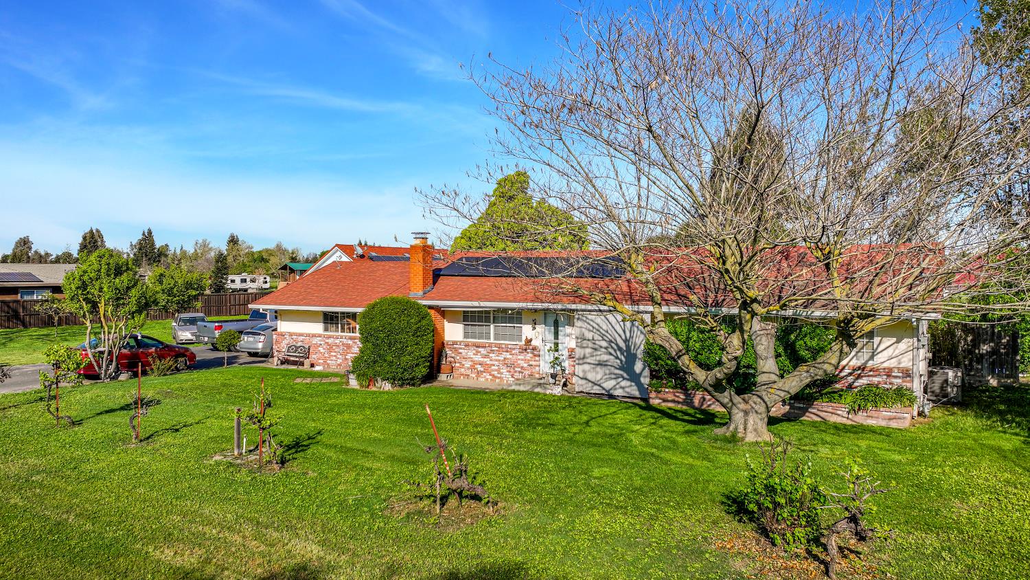 23404 Bruella Road Acampo, CA 95220 - Photo 14 of 69 a view of a garden with houses