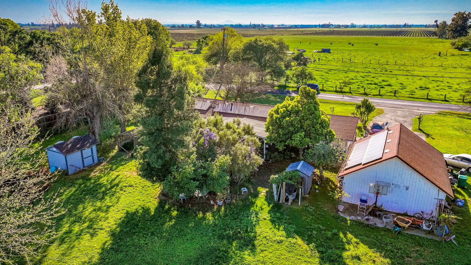 23404 Bruella Road Acampo, CA 95220 - Photo 16 of 69 an aerial view of residential houses with outdoor space and swimming pool