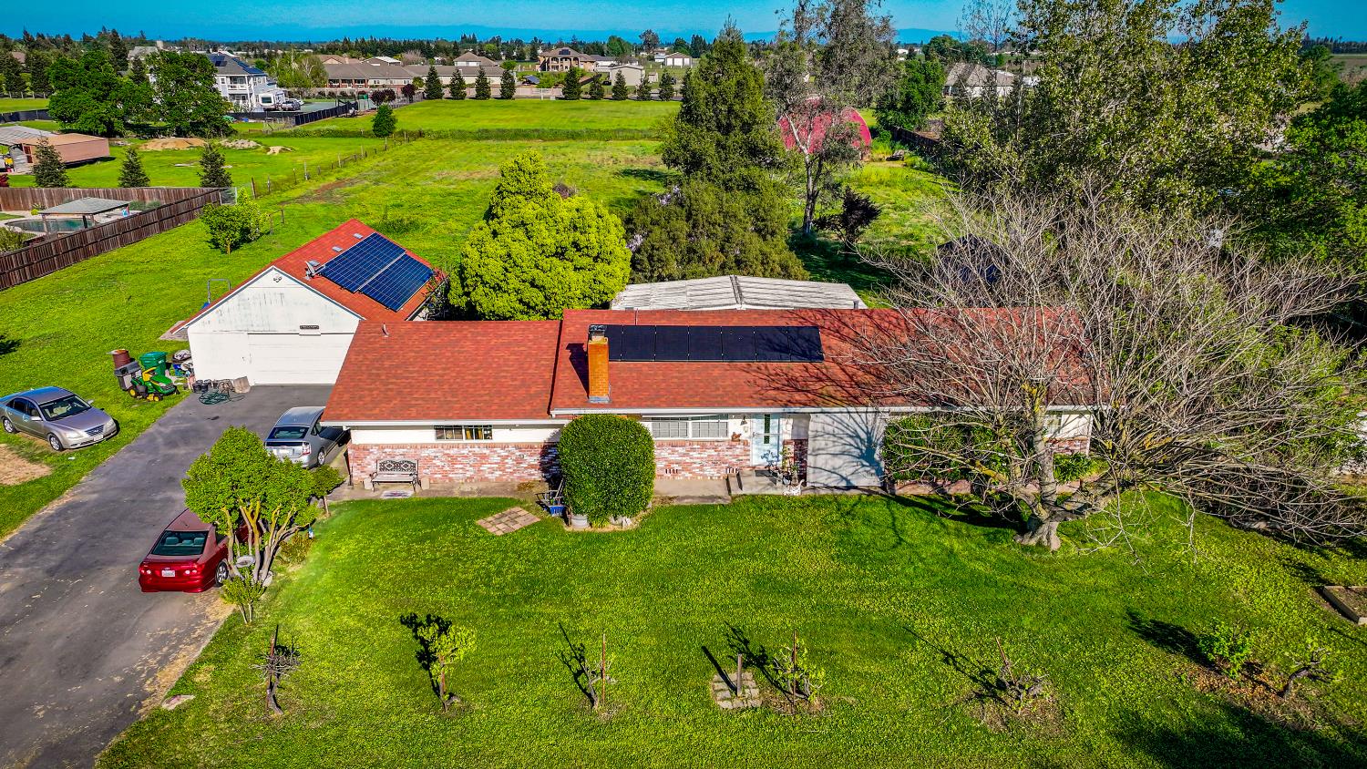 23404 Bruella Road Acampo, CA 95220 - Photo 2 of 69 an aerial view of a house with garden space and street view