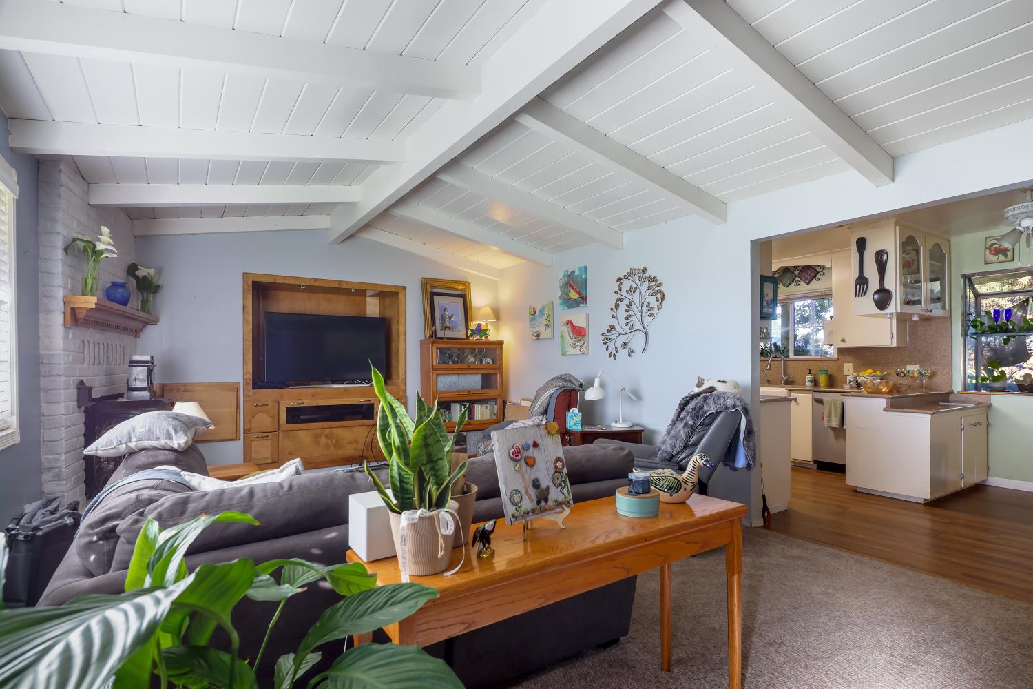 23404 Bruella Road Acampo, CA 95220 - Photo 31 of 69 a living room with furniture and a flat screen tv