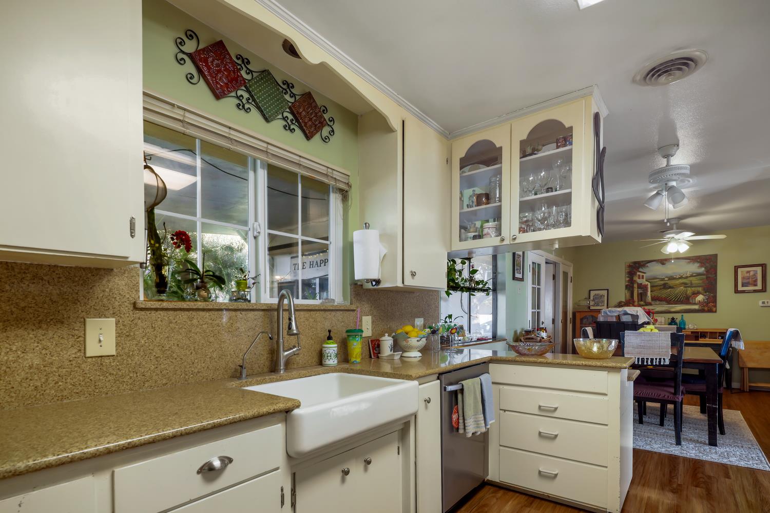 23404 Bruella Road Acampo, CA 95220 - Photo 34 of 69 a view of living room with granite countertop furniture and wooden floor