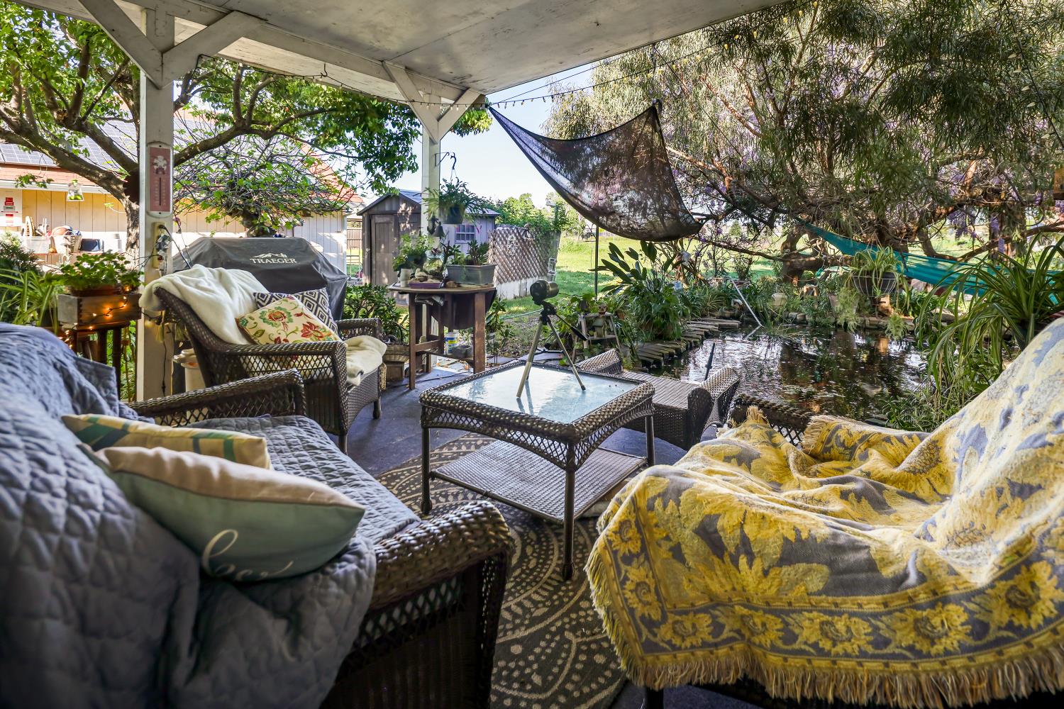 23404 Bruella Road Acampo, CA 95220 - Photo 50 of 69 a view of a chairs and table in the balcony