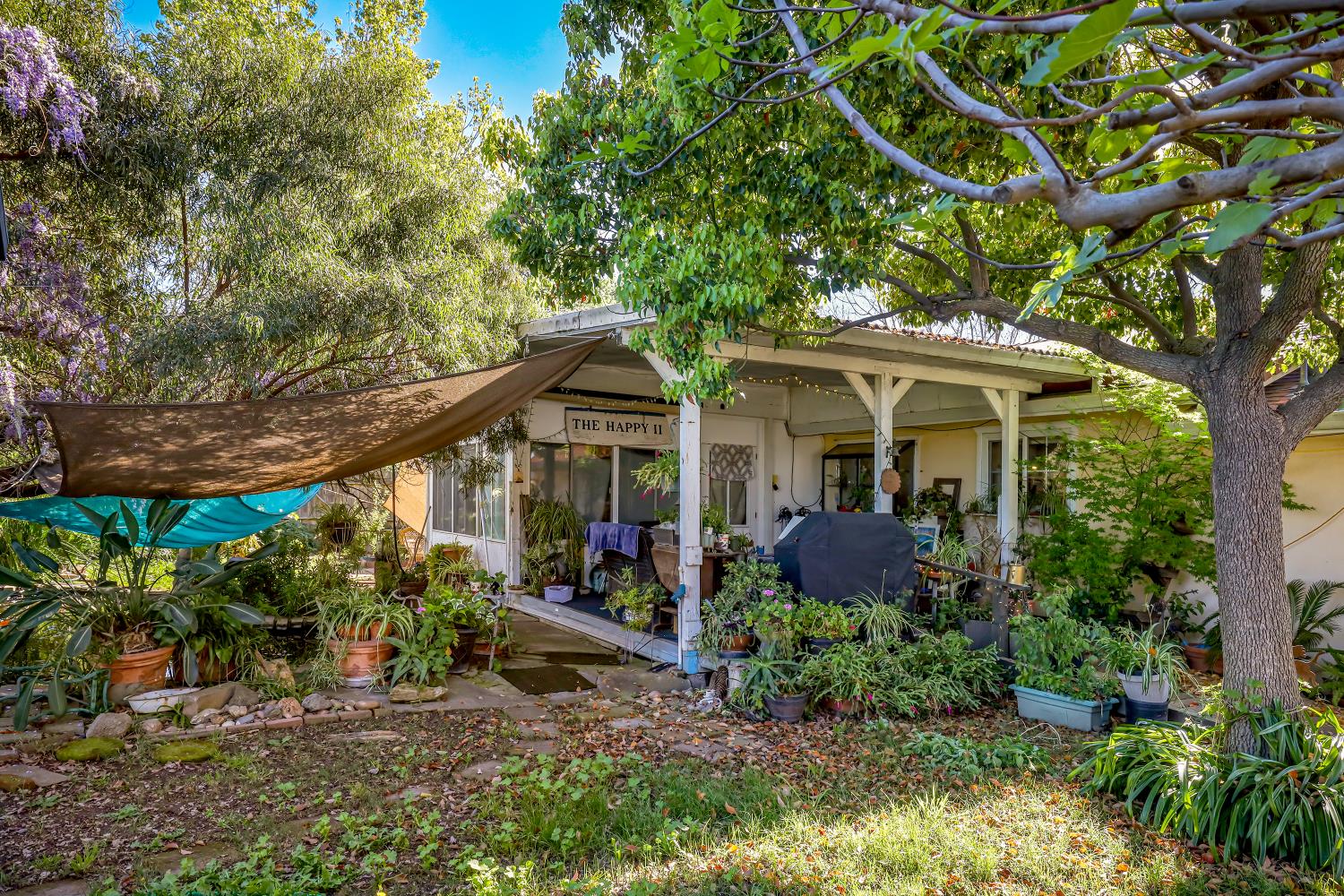 23404 Bruella Road Acampo, CA 95220 - Photo 52 of 69 a front view of a house with garden