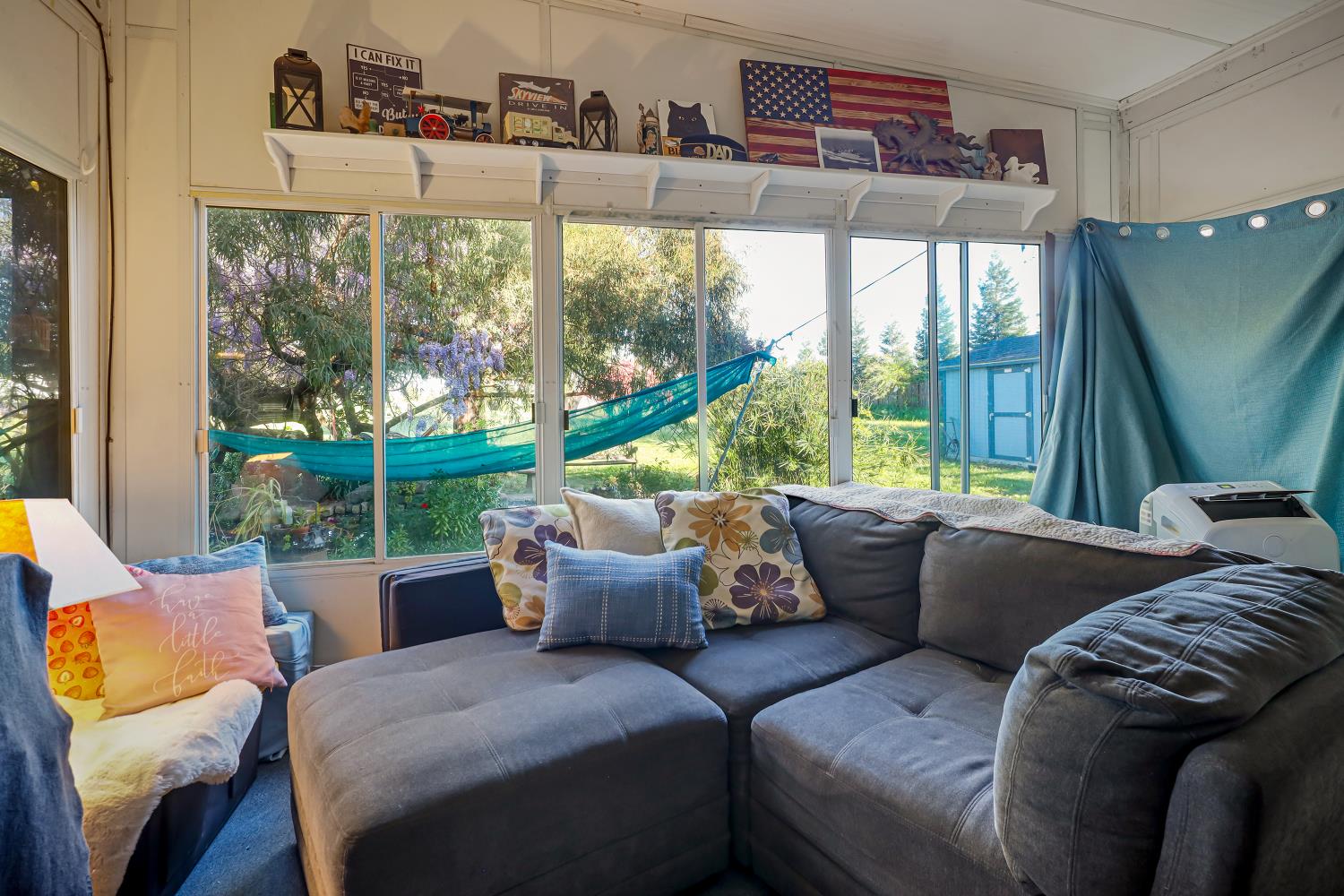 23404 Bruella Road Acampo, CA 95220 - Photo 53 of 69 a living room with furniture and a large window