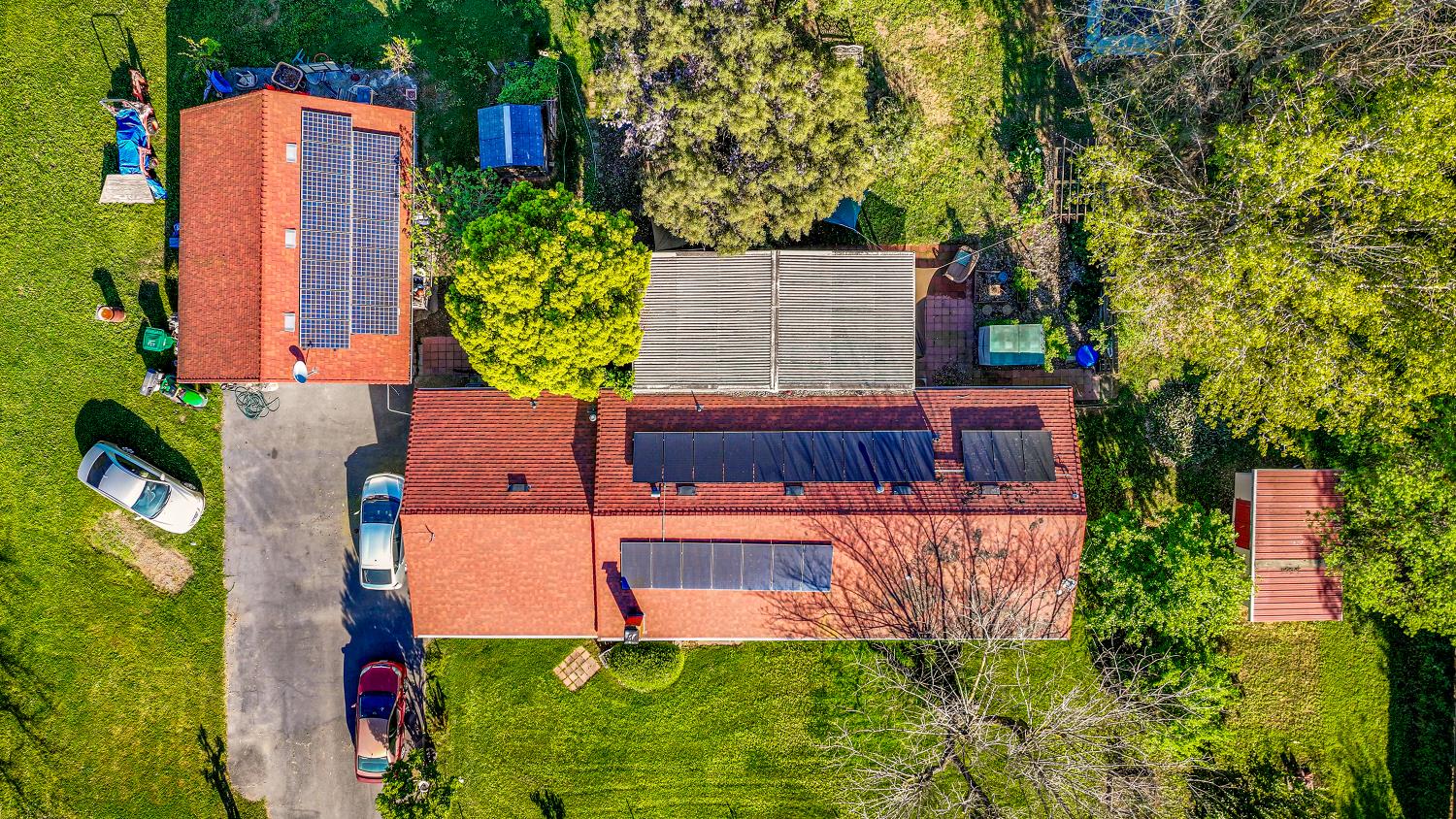 23404 Bruella Road Acampo, CA 95220 - Photo 59 of 69 an aerial view of a house with a garden and a yard