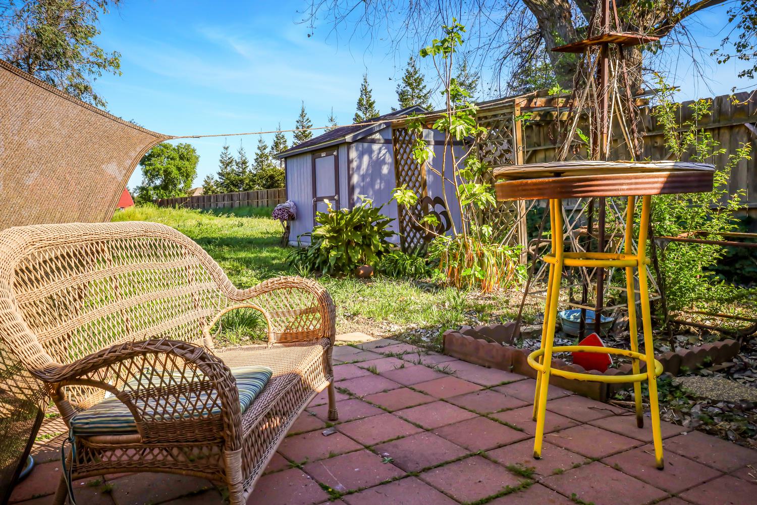 23404 Bruella Road Acampo, CA 95220 - Photo 62 of 69 a view of patio with table and chairs and potted plants