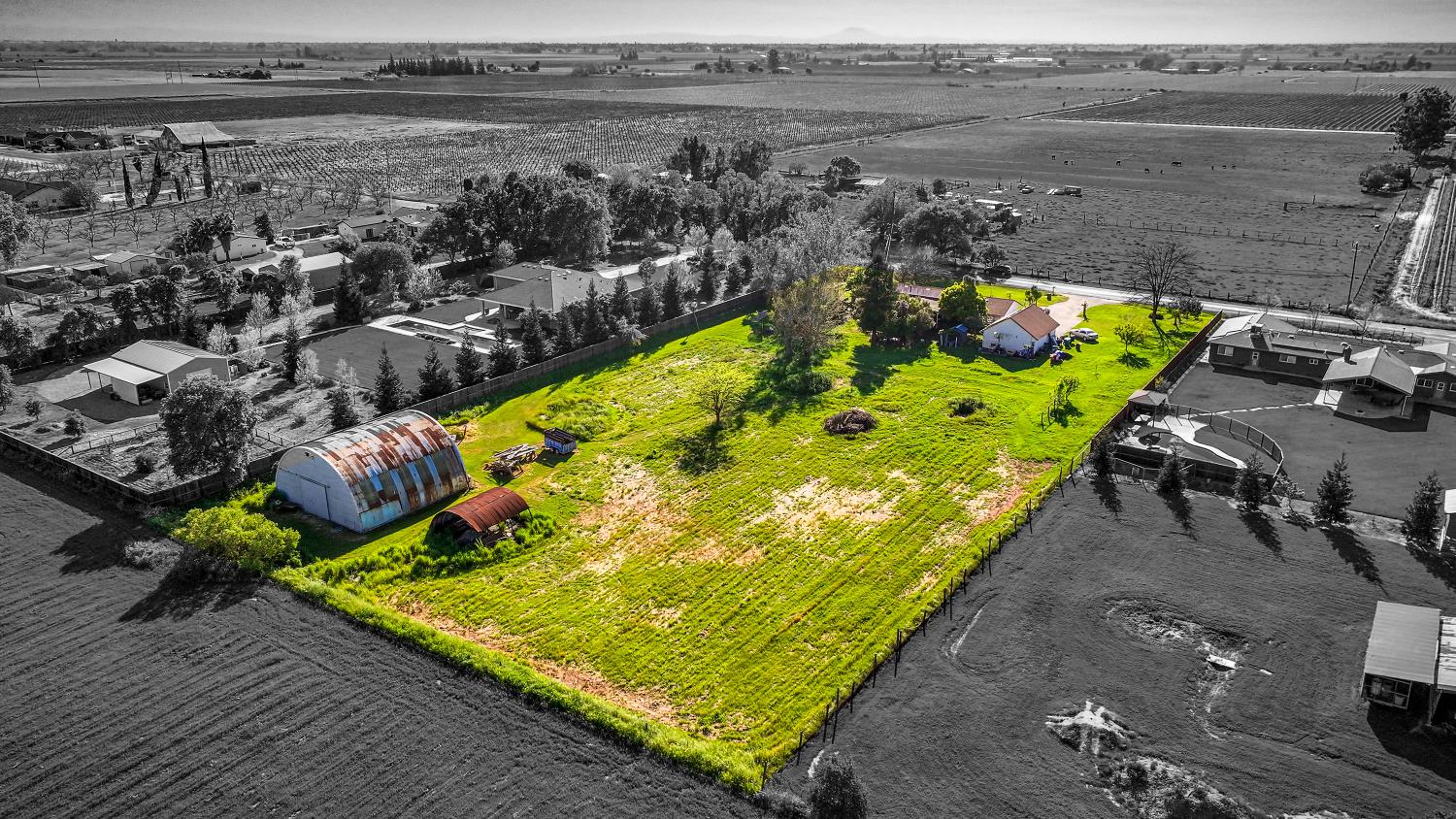 23404 Bruella Road Acampo, CA 95220 - Photo 7 of 69 a view of a swimming pool with an outdoor seating and a yard