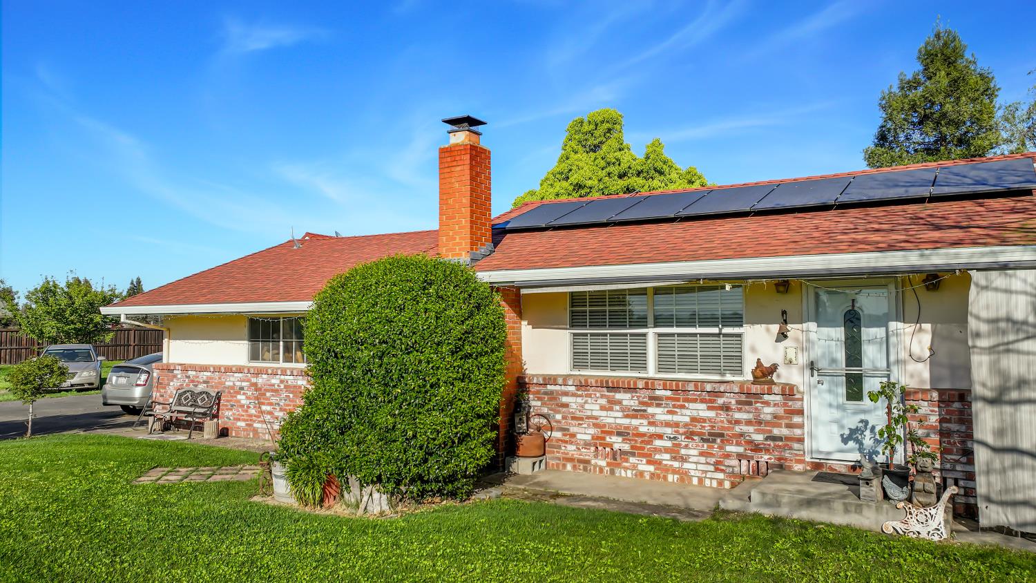 23404 Bruella Road Acampo, CA 95220 - Photo 10 of 69 a front view of a house with garden