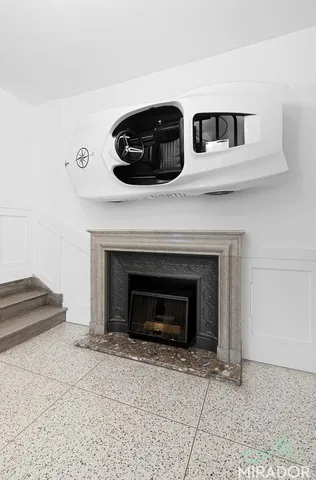 a stove top oven sitting inside of a kitchen