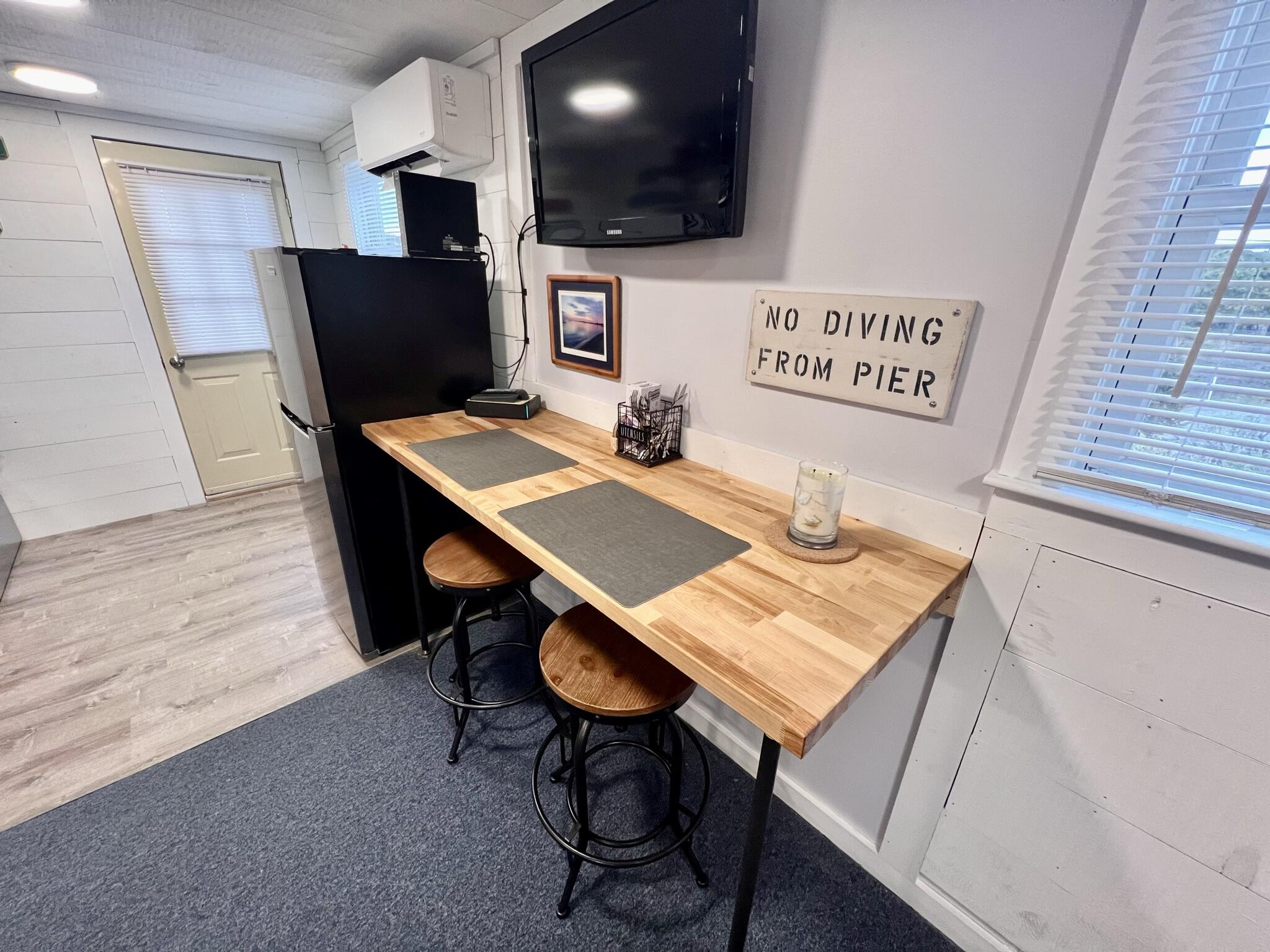 168 Shore Road, Unit 3 Truro, MA 02666 - Photo 13 of 14 a view of a workspace with furniture