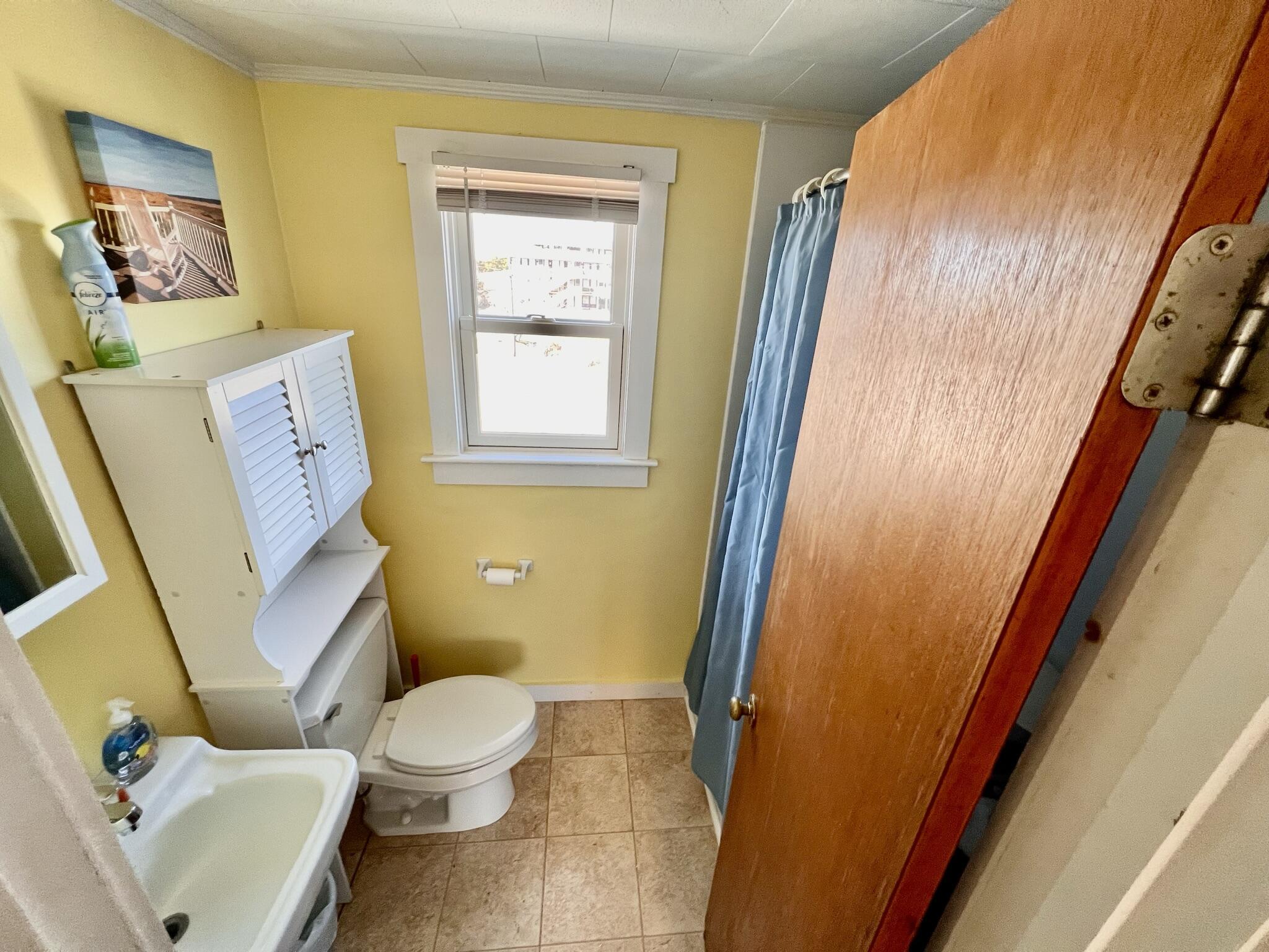 168 Shore Road, Unit 3 Truro, MA 02666 - Photo 14 of 14 a bathroom with a sink and a mirror