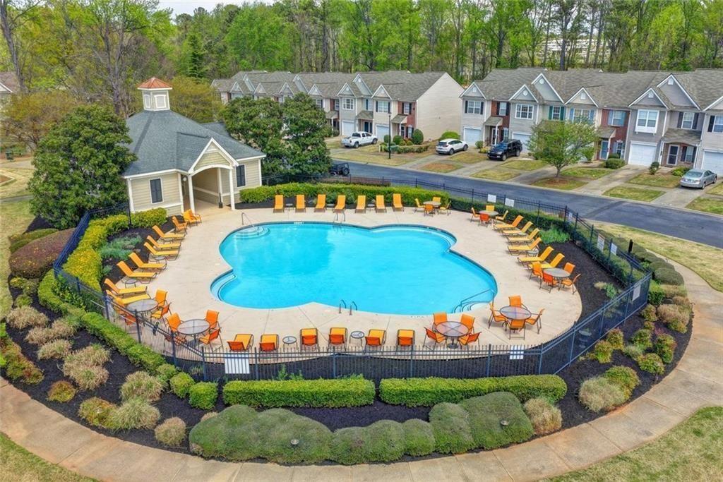 310 Azalea Circle Cumming, GA 30040 - Photo 32 of 38 an aerial view of a house with outdoor space swimming pool and outdoor seating