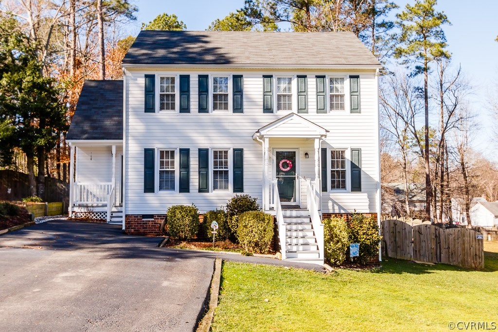 a front view of a house with swimming pool