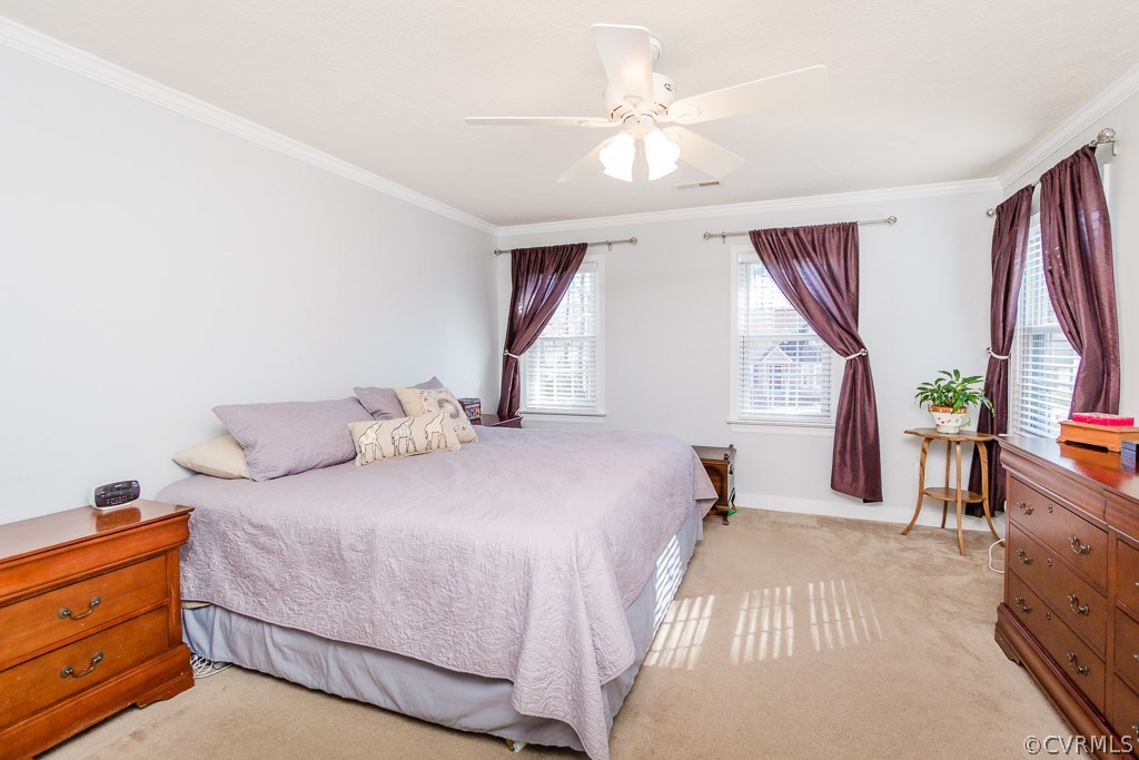 2612 Iverson Road Midlothian, VA 23112 - Photo 10 of 23 a bedroom with a bed and wooden floor