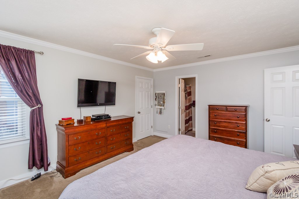 2612 Iverson Road Midlothian, VA 23112 - Photo 11 of 23 a bedroom with furniture and a flat screen tv