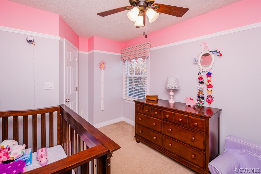 2612 Iverson Road Midlothian, VA 23112 - Photo 16 of 23 a bedroom with a bed and a dresser