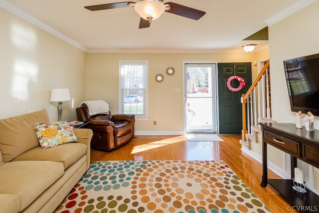 2612 Iverson Road Midlothian, VA 23112 - Photo 2 of 23 a living room with furniture and a flat screen tv