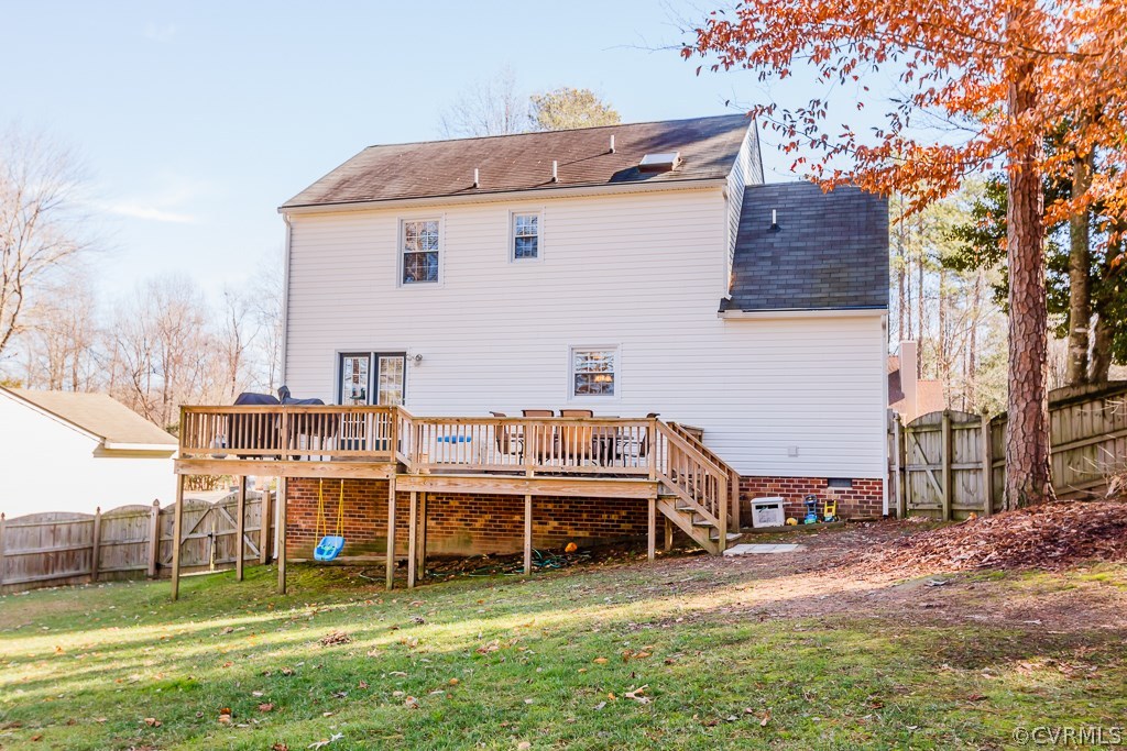 2612 Iverson Road Midlothian, VA 23112 - Photo 20 of 23 a view of a house with a backyard and a patio