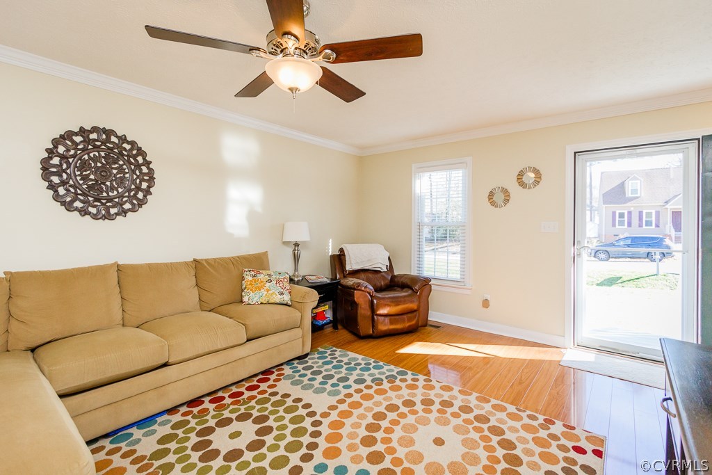 2612 Iverson Road Midlothian, VA 23112 - Photo 3 of 23 a living room with furniture and a couch
