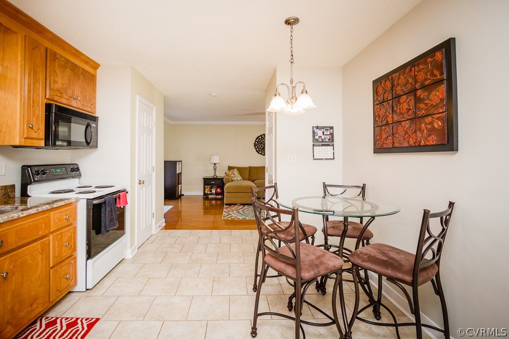 2612 Iverson Road Midlothian, VA 23112 - Photo 5 of 23 a view of a dining room with furniture