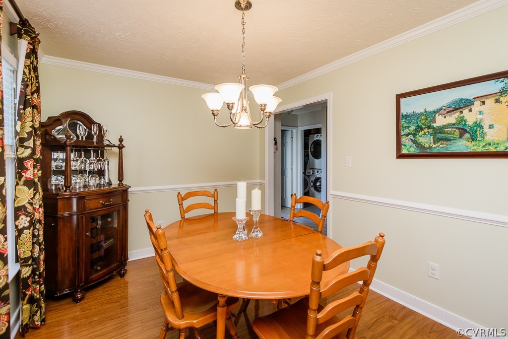 2612 Iverson Road Midlothian, VA 23112 - Photo 8 of 23 a dining room with furniture and wooden floor