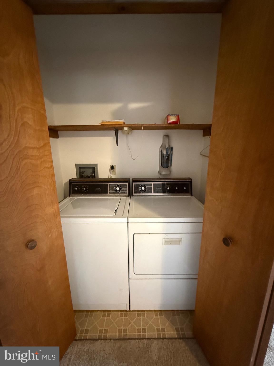 992 Silver Lane Berkeley Springs, WV 25411 - Photo 17 of 44 a utility room with dryer and washer