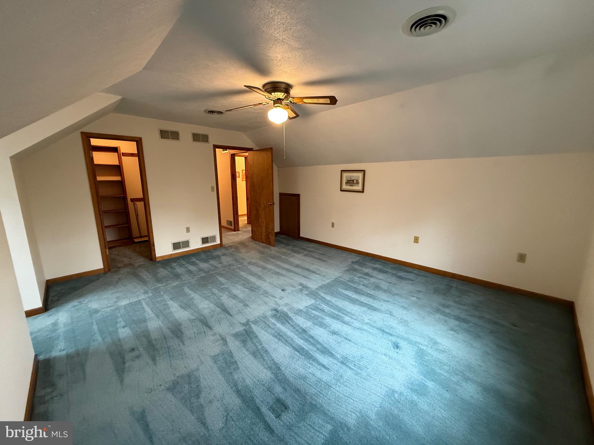 992 Silver Lane Berkeley Springs, WV 25411 - Photo 18 of 44 wooden floor in an empty room