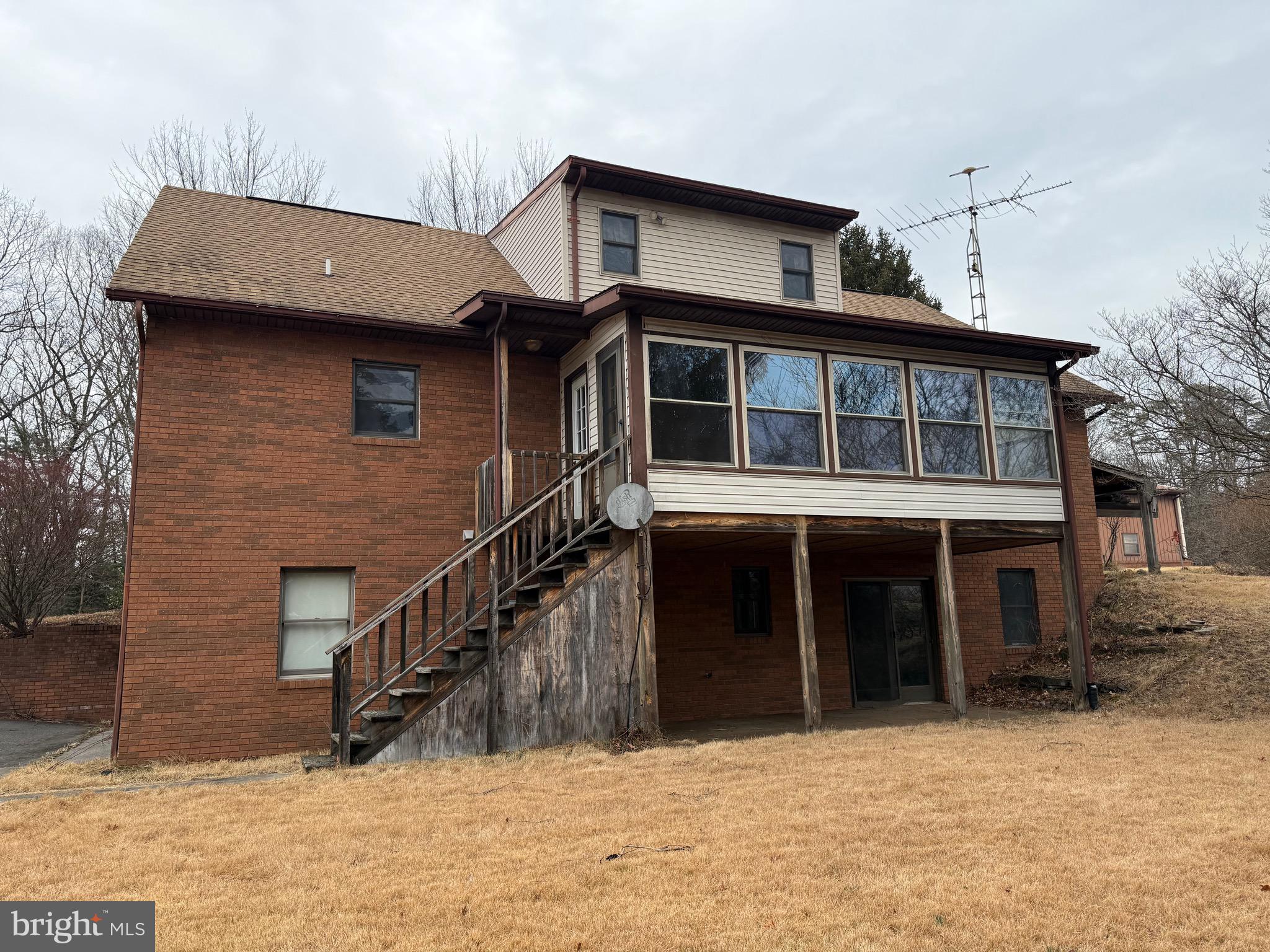 992 Silver Lane Berkeley Springs, WV 25411 - Photo 33 of 44 a front view of a house with a yard