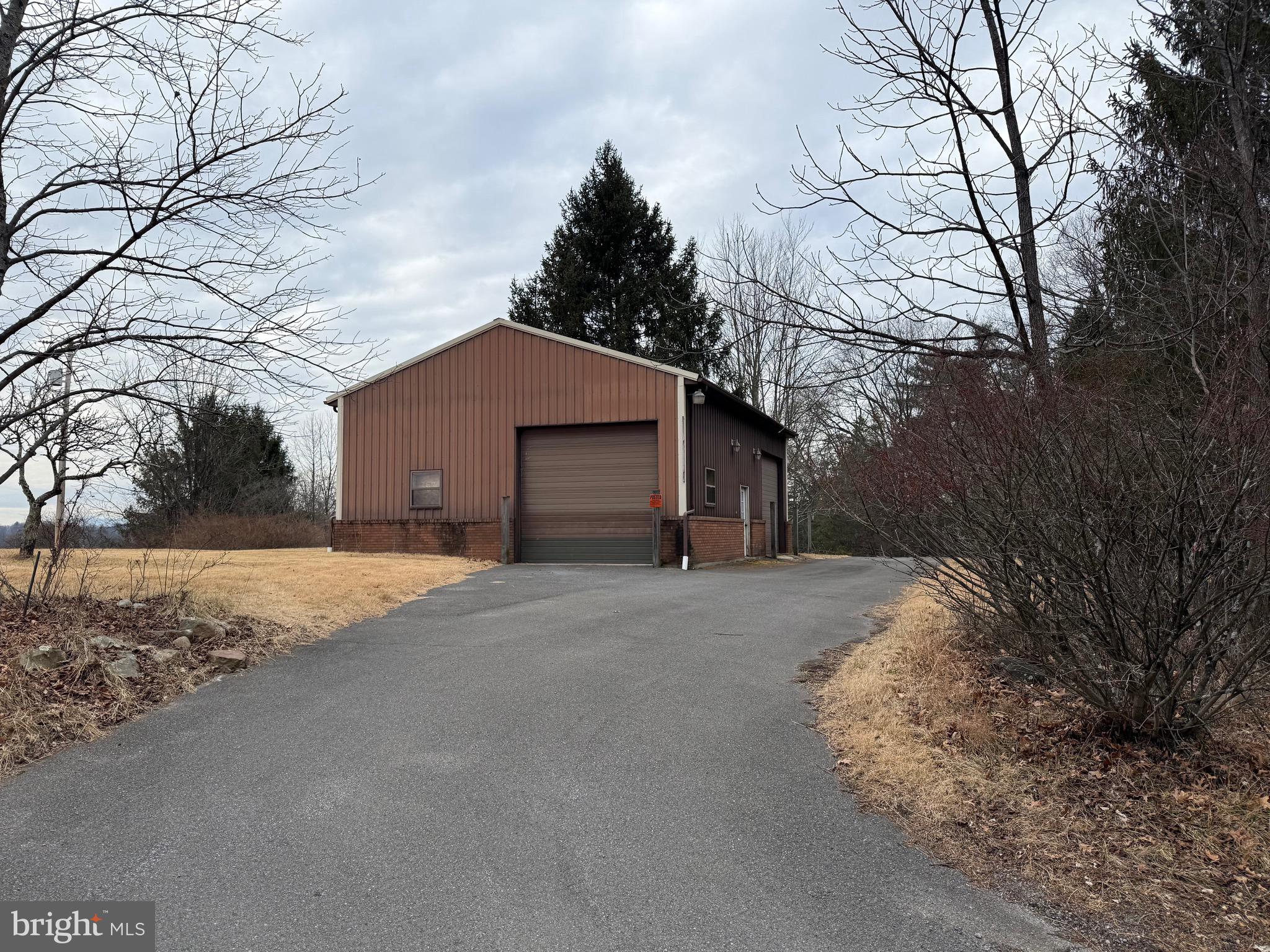 992 Silver Lane Berkeley Springs, WV 25411 - Photo 39 of 44 a view of a house with a yard covered in snow