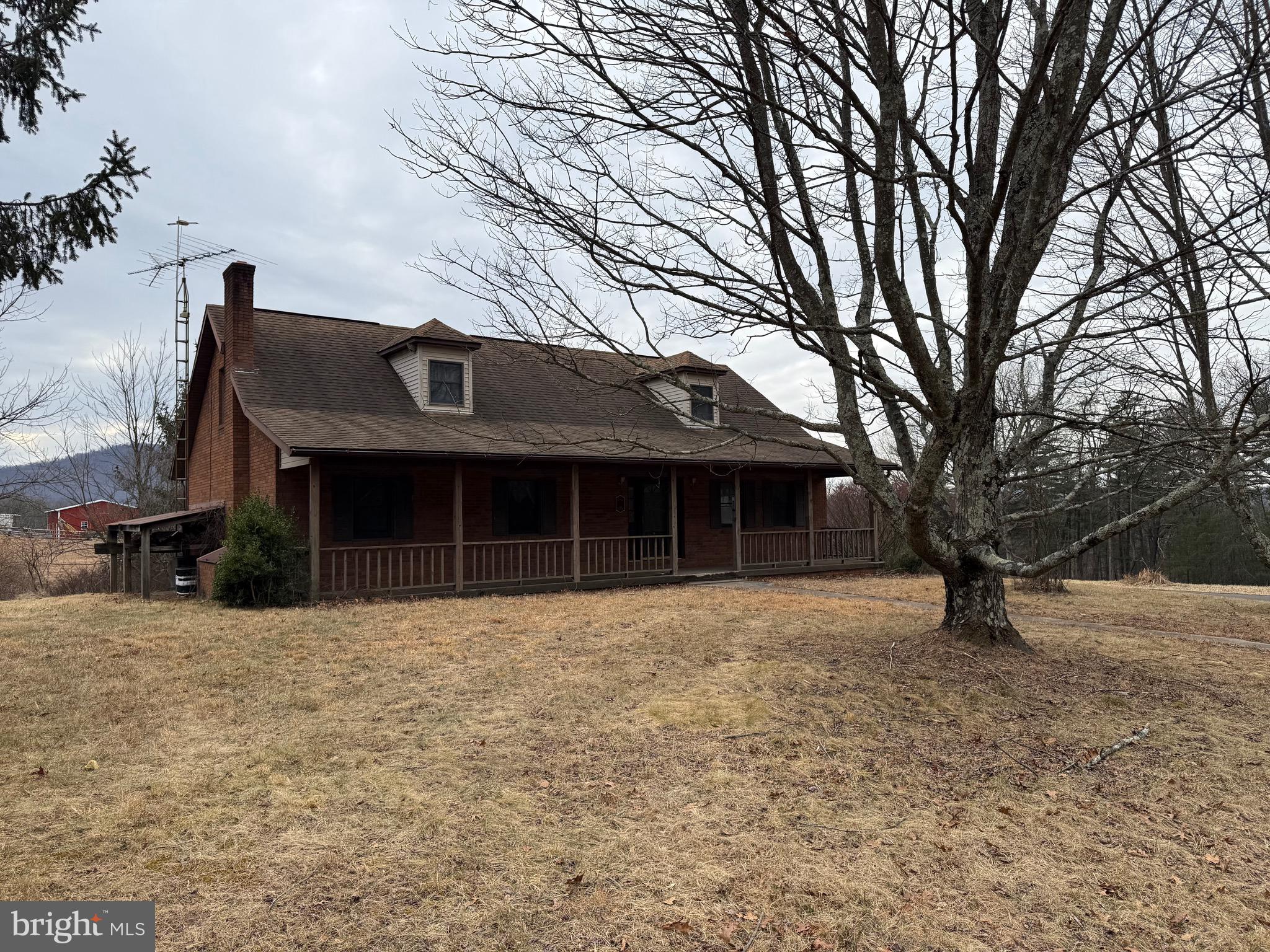 992 Silver Lane Berkeley Springs, WV 25411 - Photo 40 of 44 a front view of a house with a yard