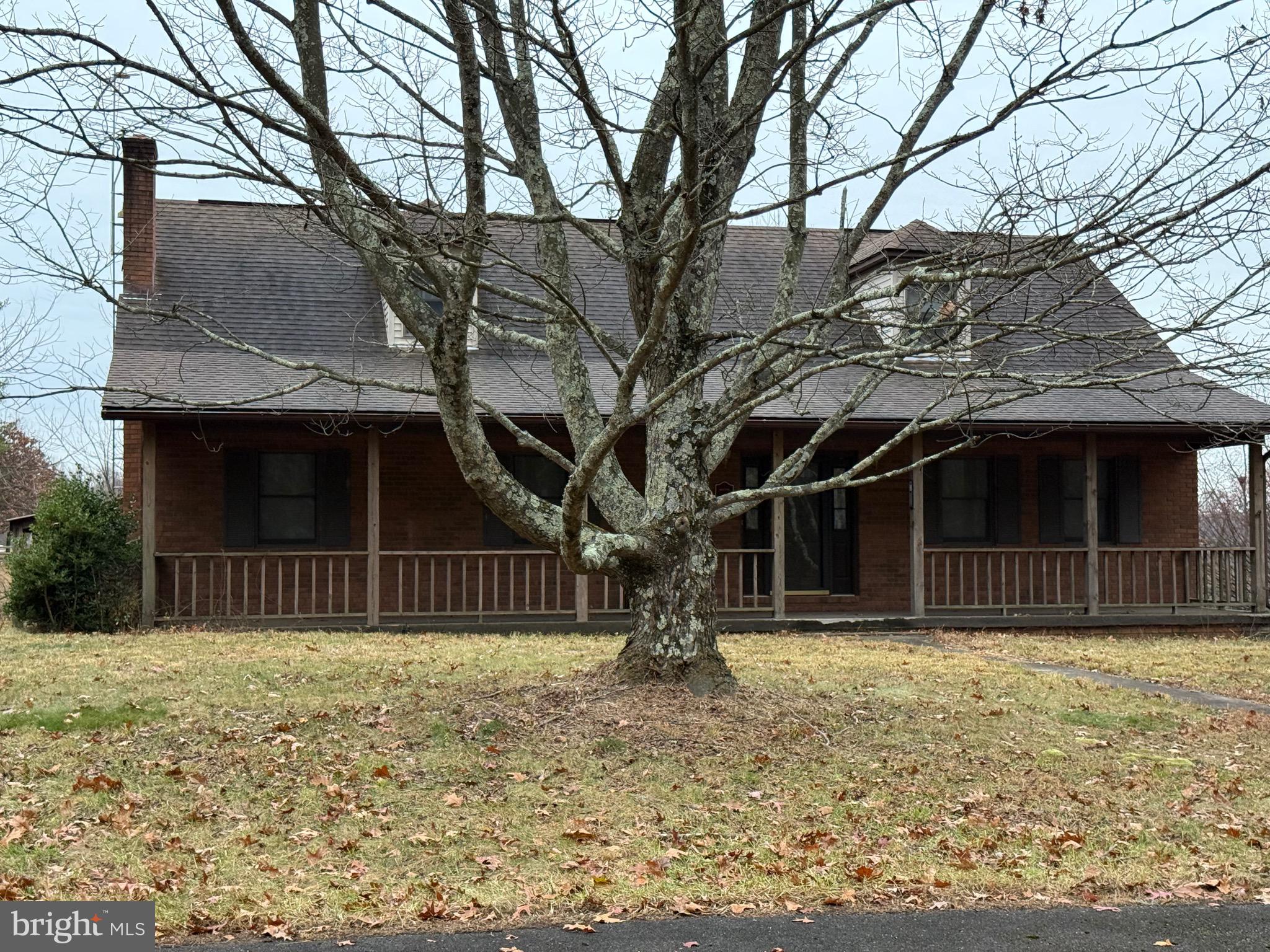 992 Silver Lane Berkeley Springs, WV 25411 - Photo 41 of 44 a front view of a house with a tree