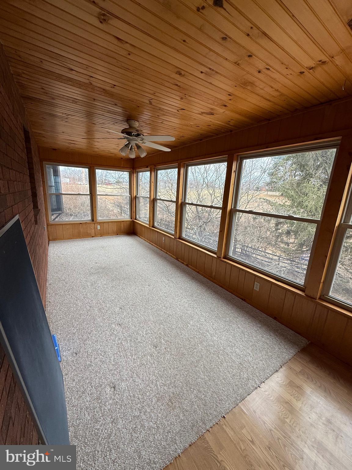 992 Silver Lane Berkeley Springs, WV 25411 - Photo 7 of 44 a view of an empty room with a window