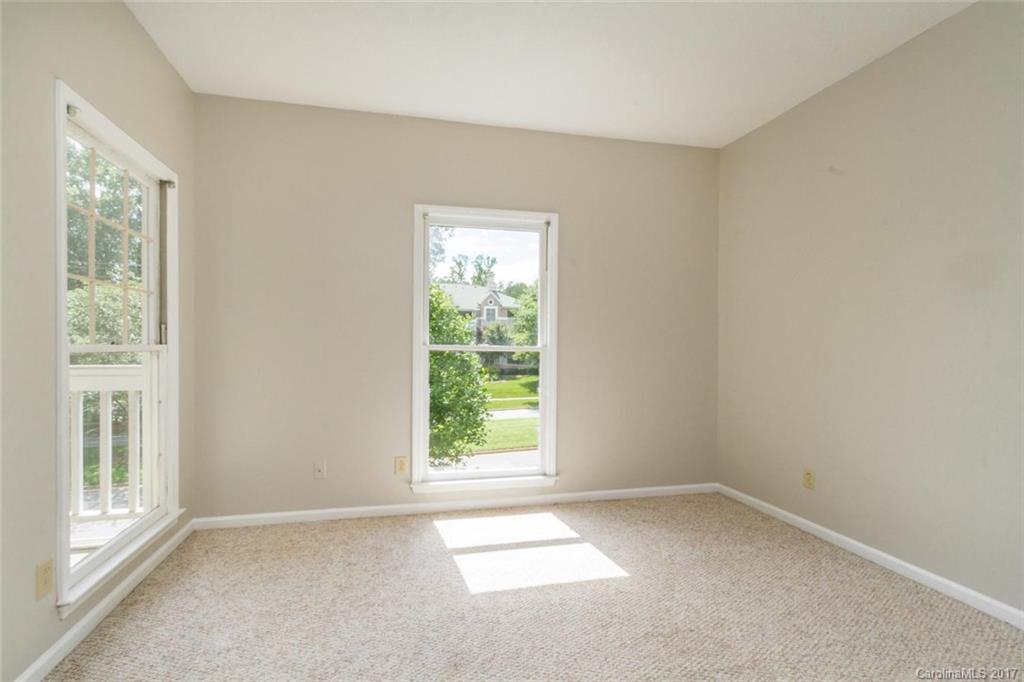 301 Queens Road, Unit 201 Charlotte, NC 28204 - Photo 15 of 24 an empty room with a window