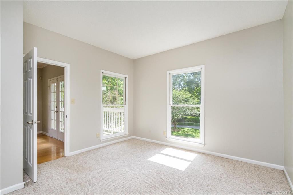 301 Queens Road, Unit 201 Charlotte, NC 28204 - Photo 16 of 24 a view of an empty room with a window